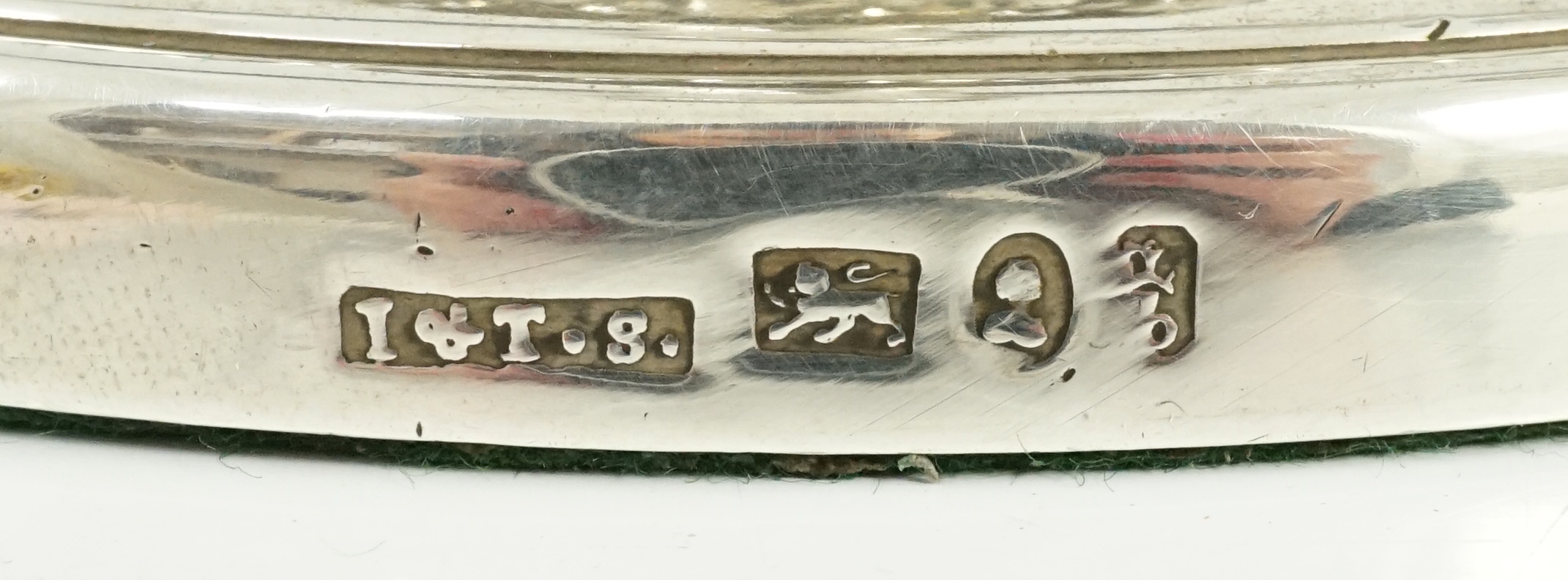 A pair of George III silver candlesticks by John & Thomas Settle